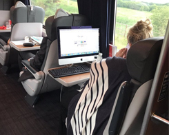 Passenger Shows The Surprising Portability of iMacs By Using One On A Train